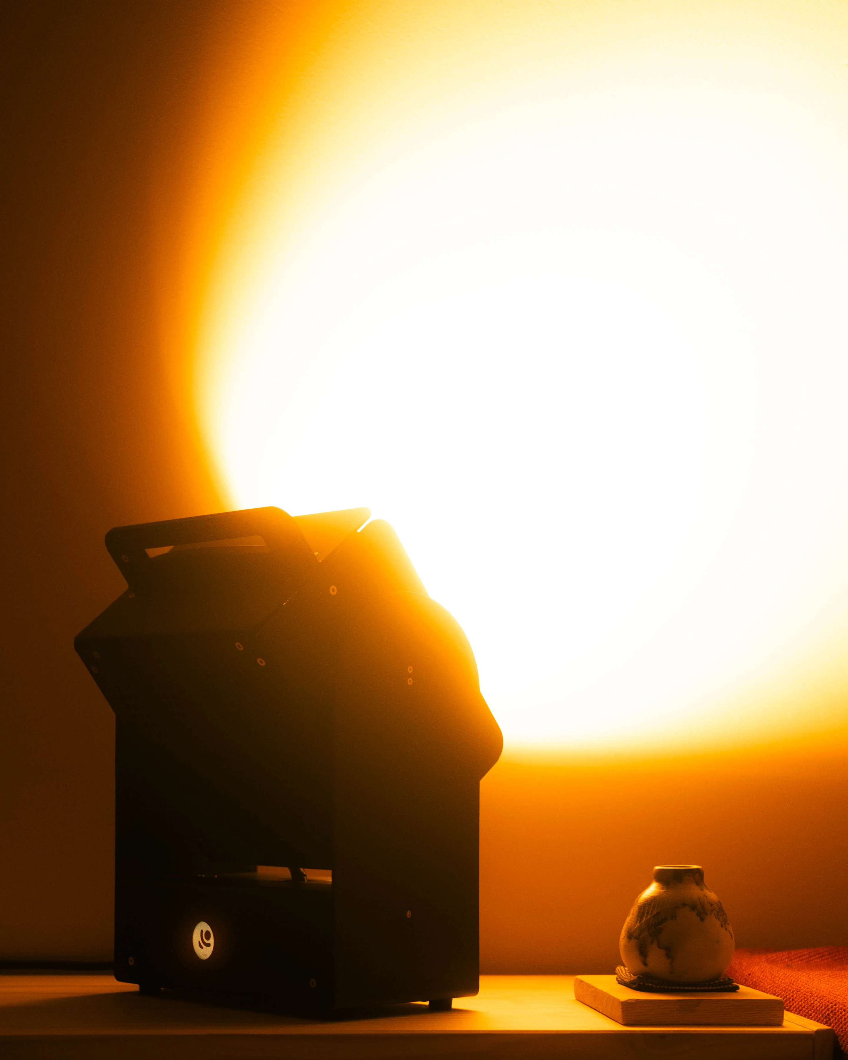 A Rhythm sunlight generator lighting a room — After dark