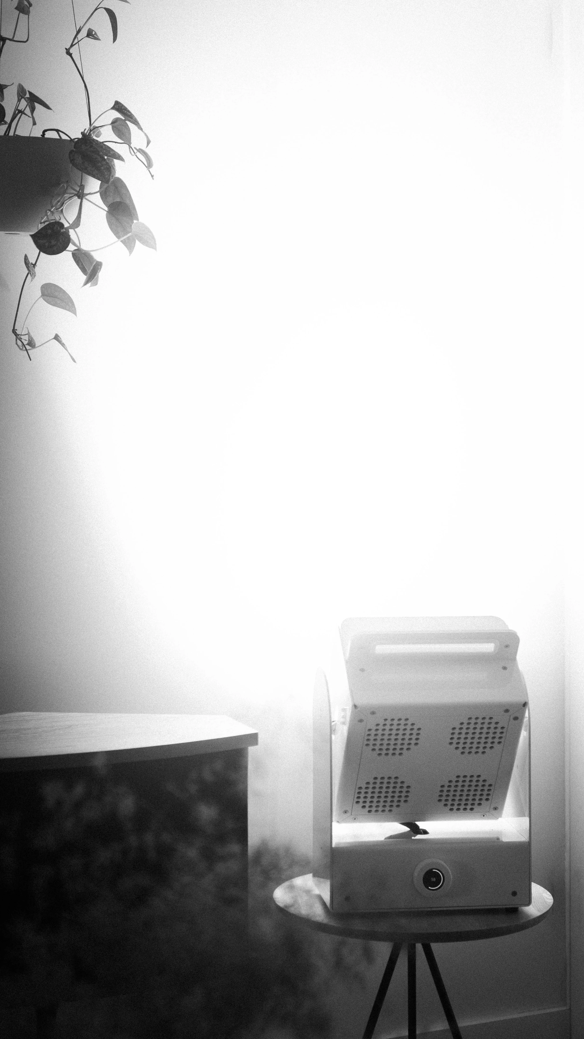 A Rhythm sunlight generator lighting a room — An evening indoors
