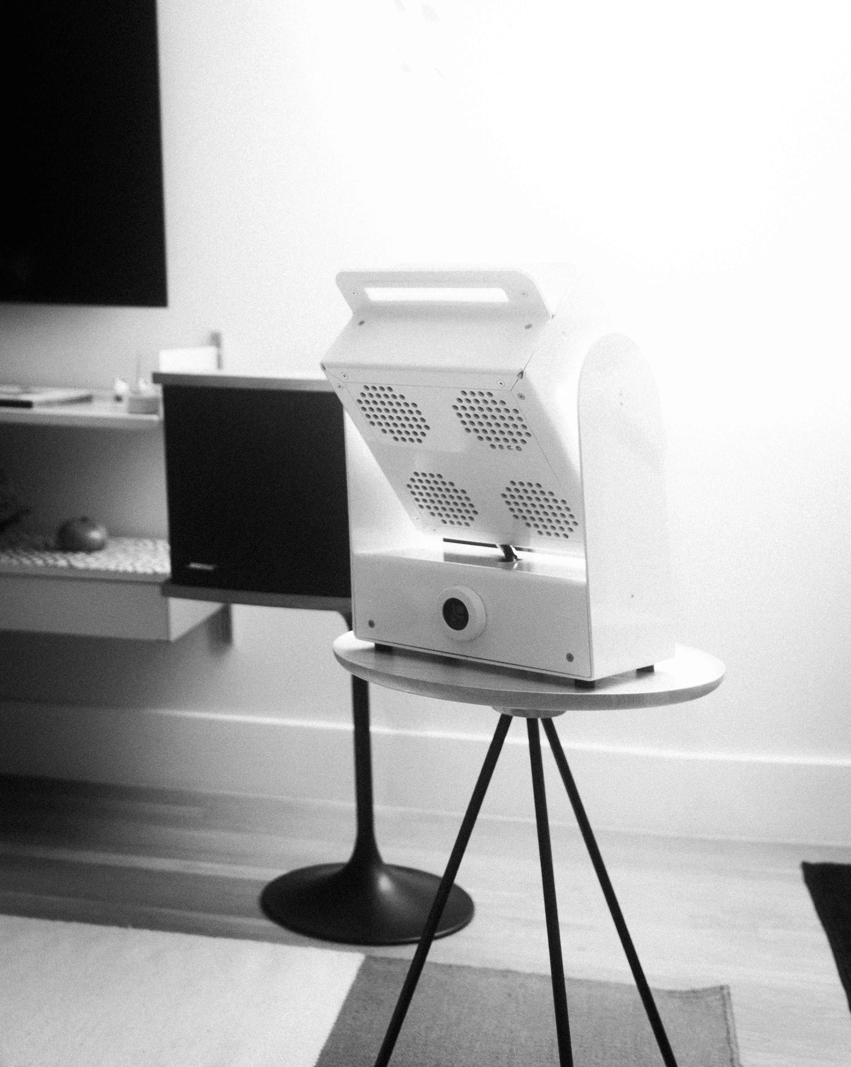 A Rhythm sunlight generator lighting a room — An evening indoors