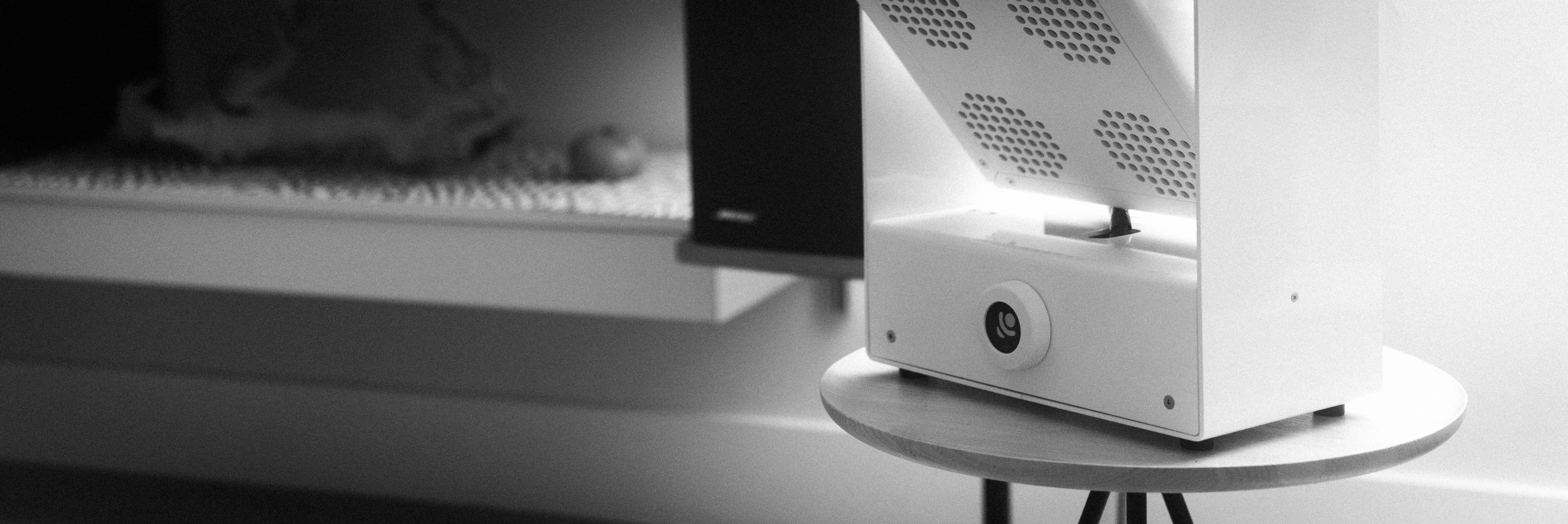 A Rhythm sunlight generator lighting a room — An evening indoors