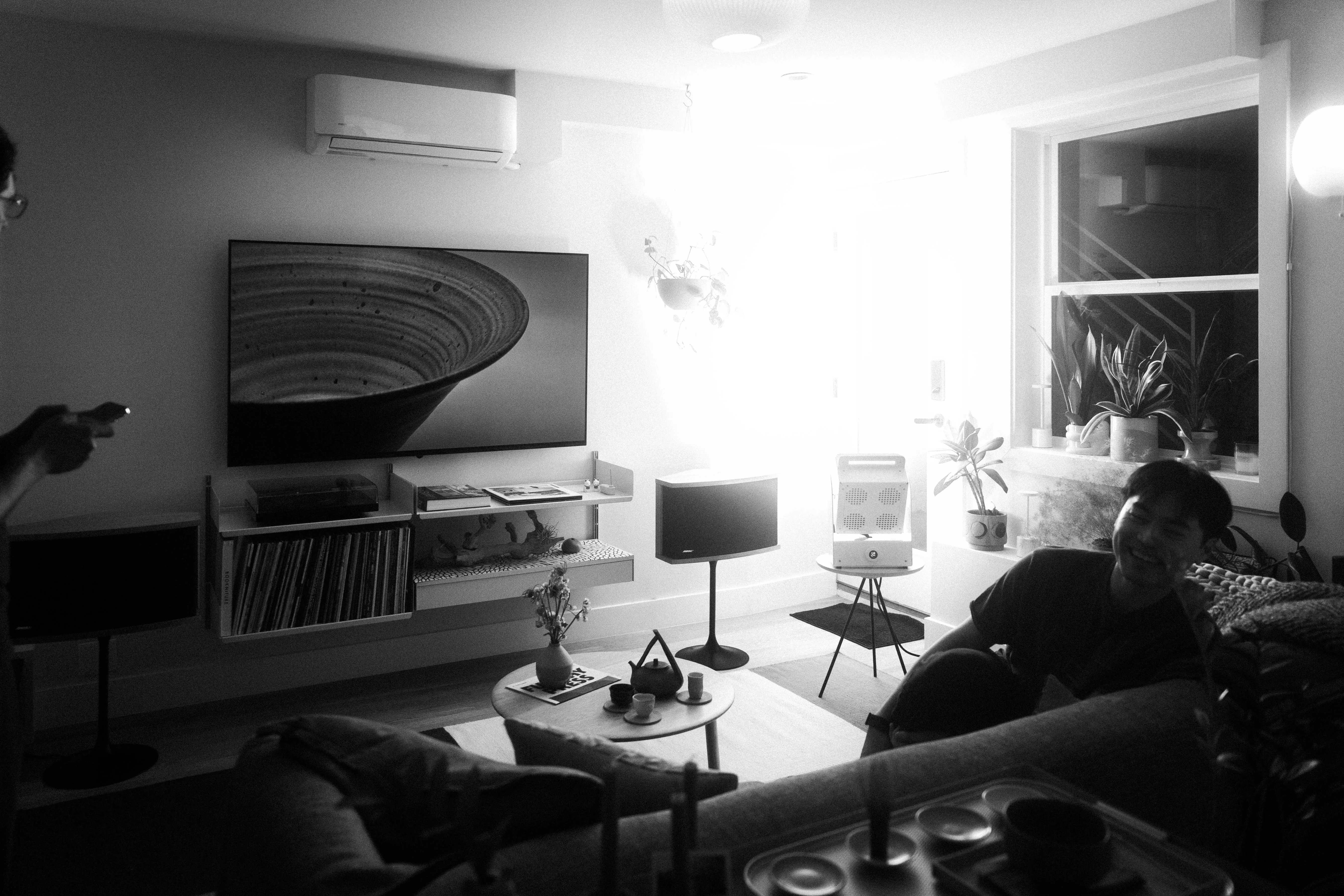 A Rhythm sunlight generator lighting a room — An evening indoors