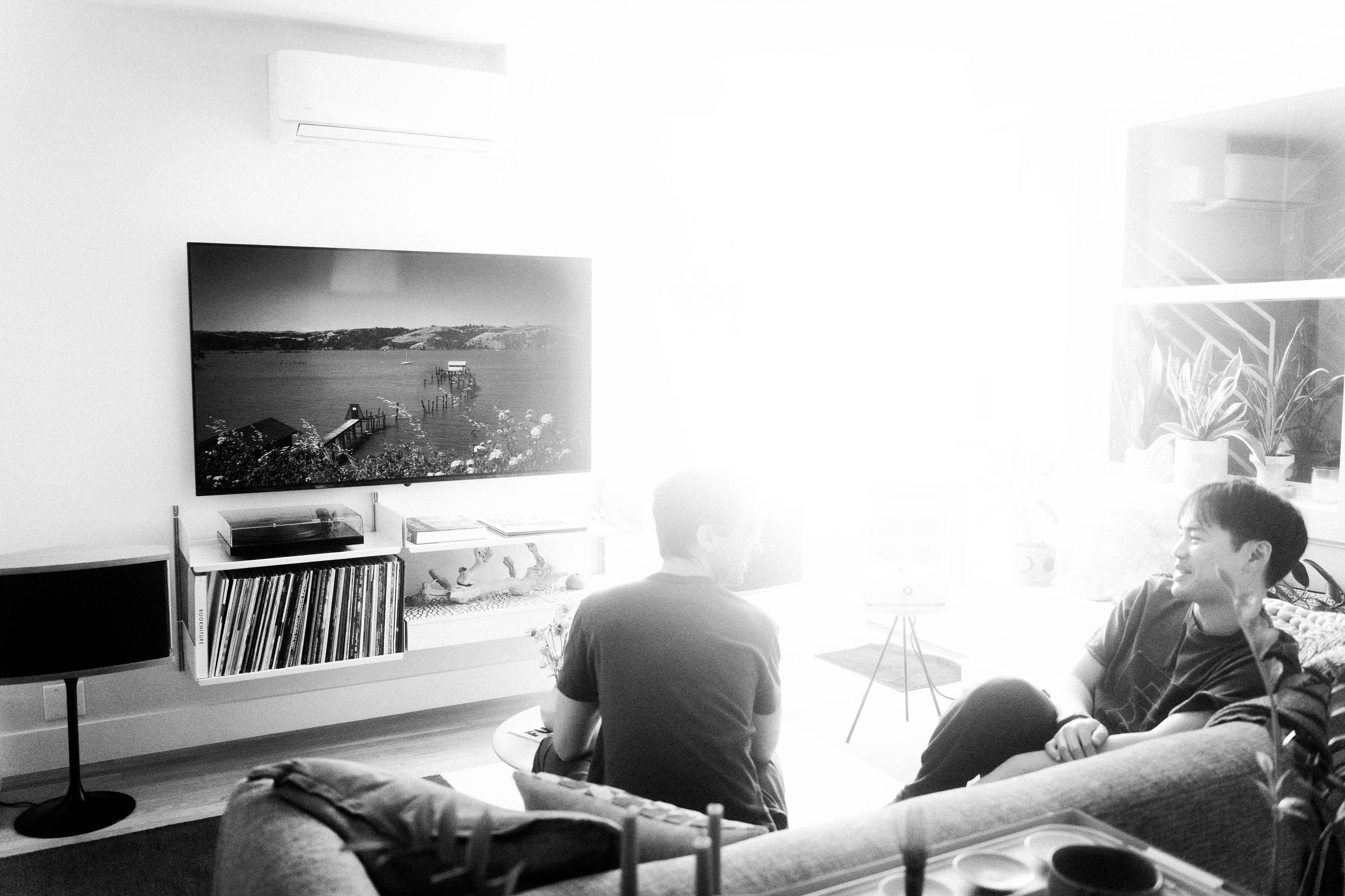 A Rhythm sunlight generator lighting a room — An evening indoors