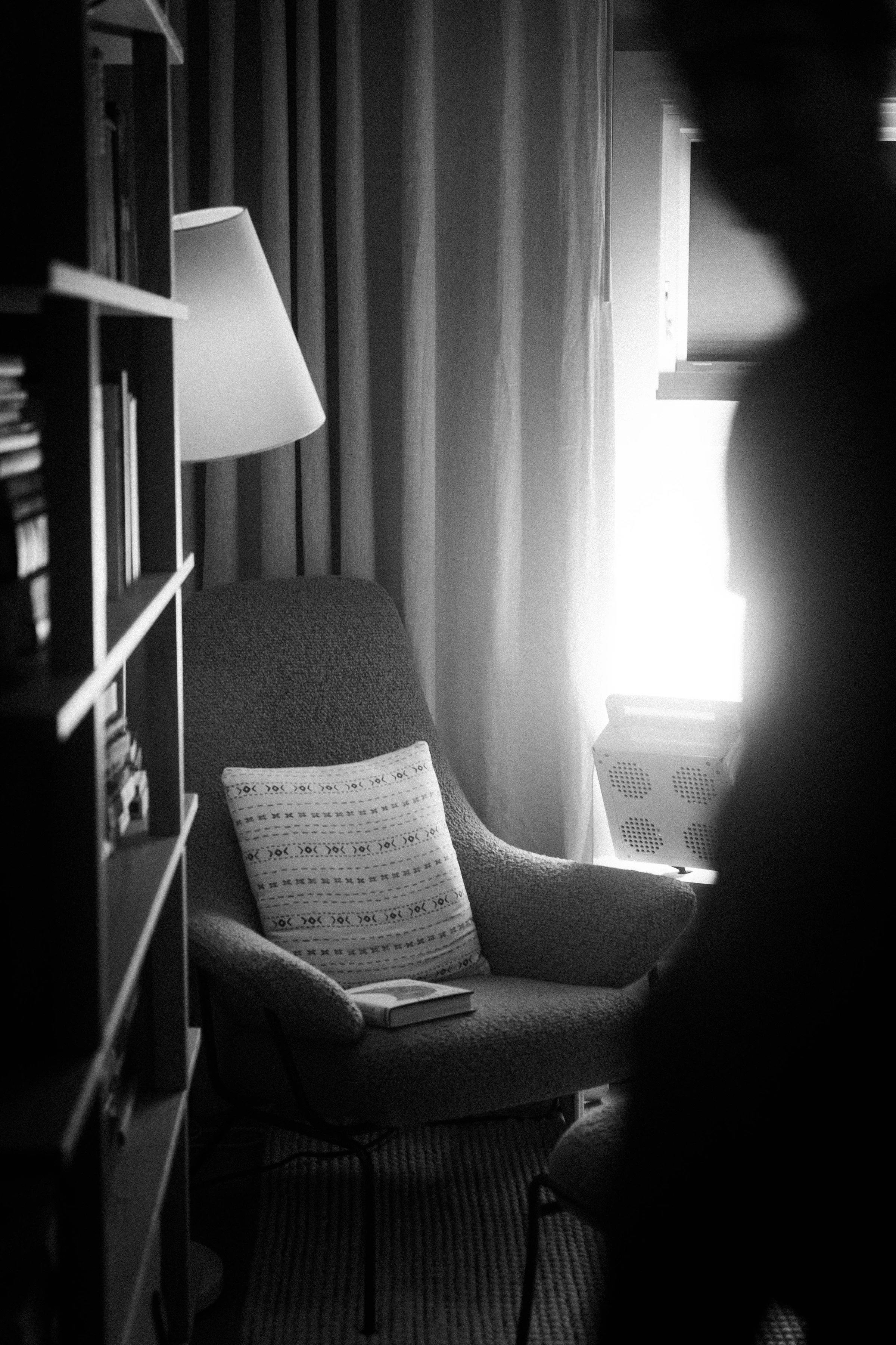 A Rhythm sunlight generator lighting a room — An evening indoors