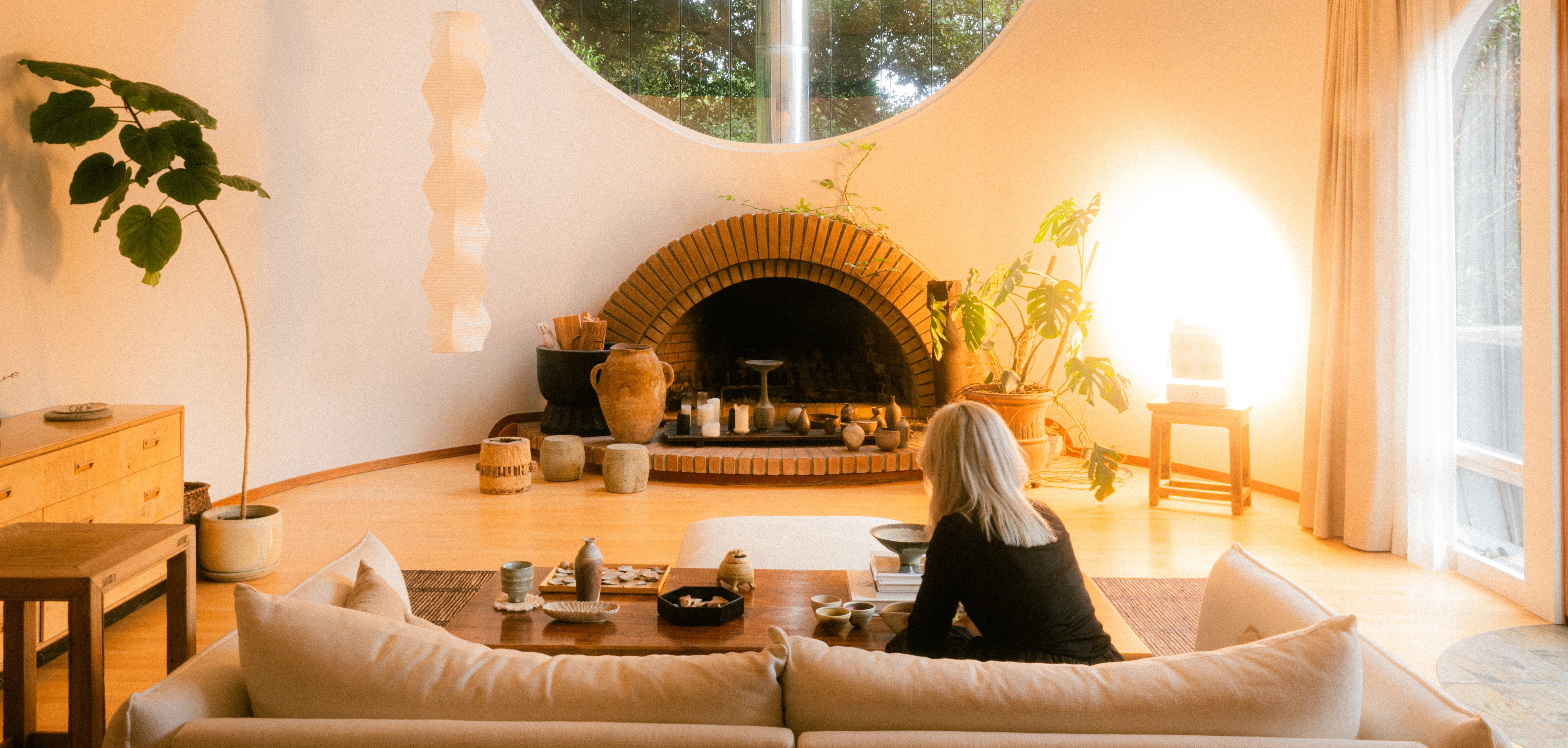 A Rhythm sunlight generator lighting a room — The Moon House