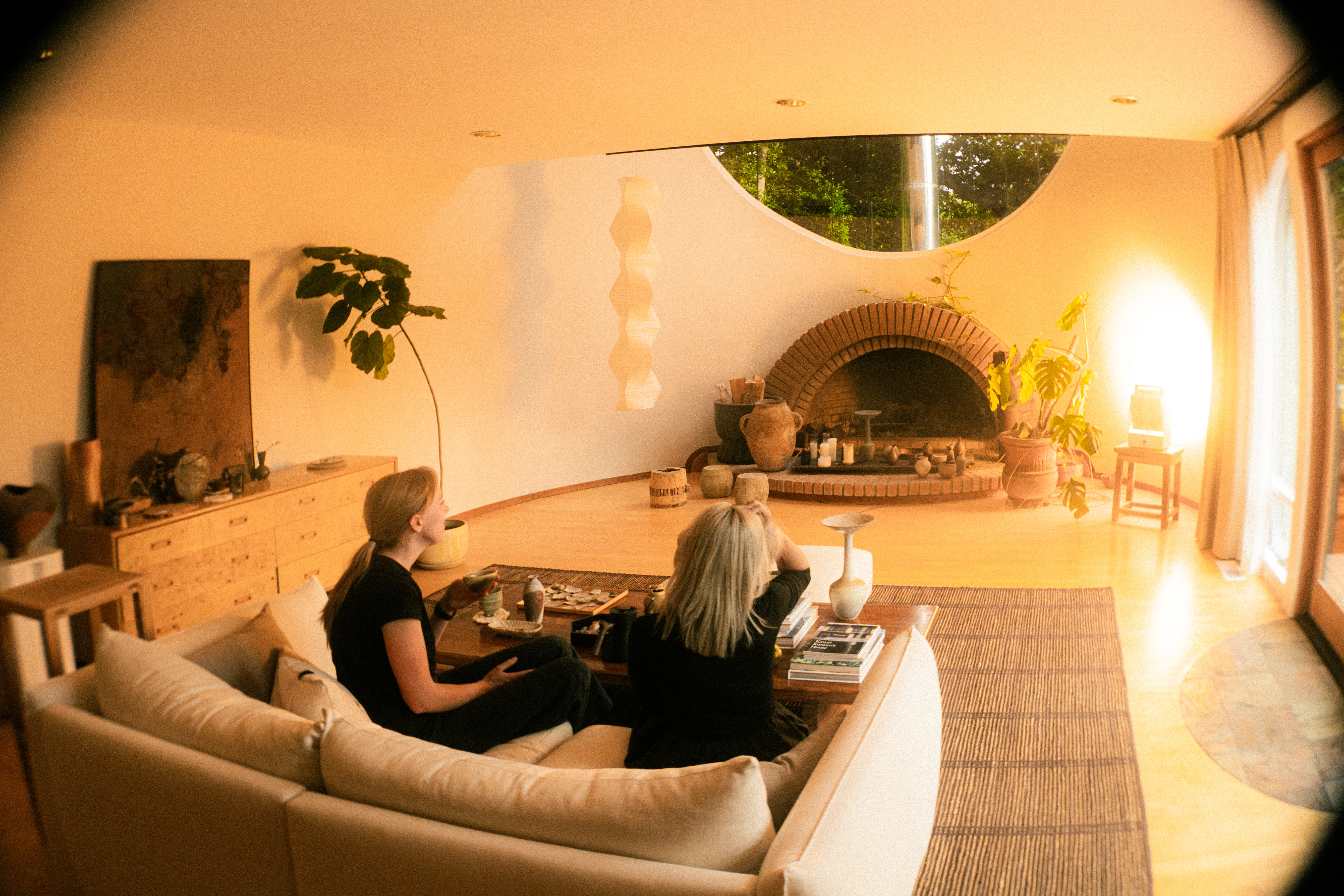 A Rhythm sunlight generator lighting a room — The Moon House