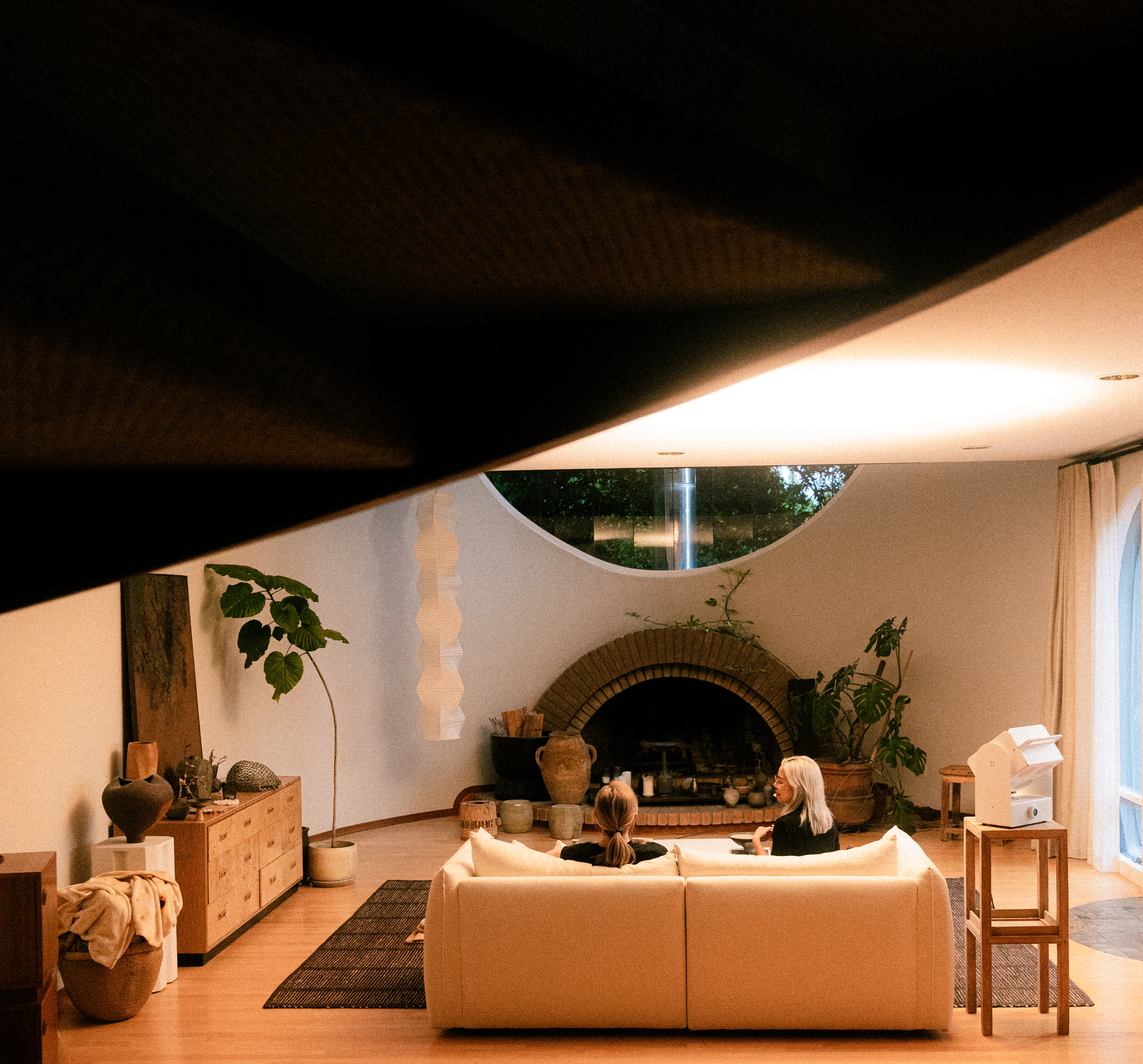 A Rhythm sunlight generator lighting a room — The Moon House