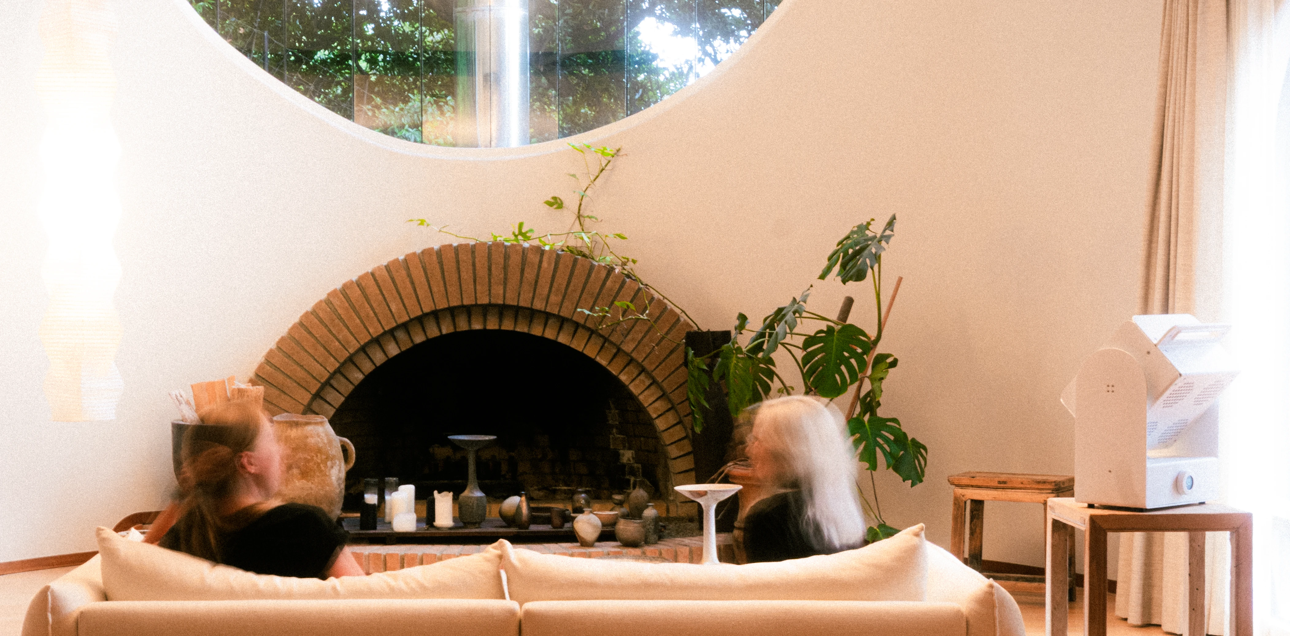 A Rhythm sunlight generator lighting a room — The Moon House