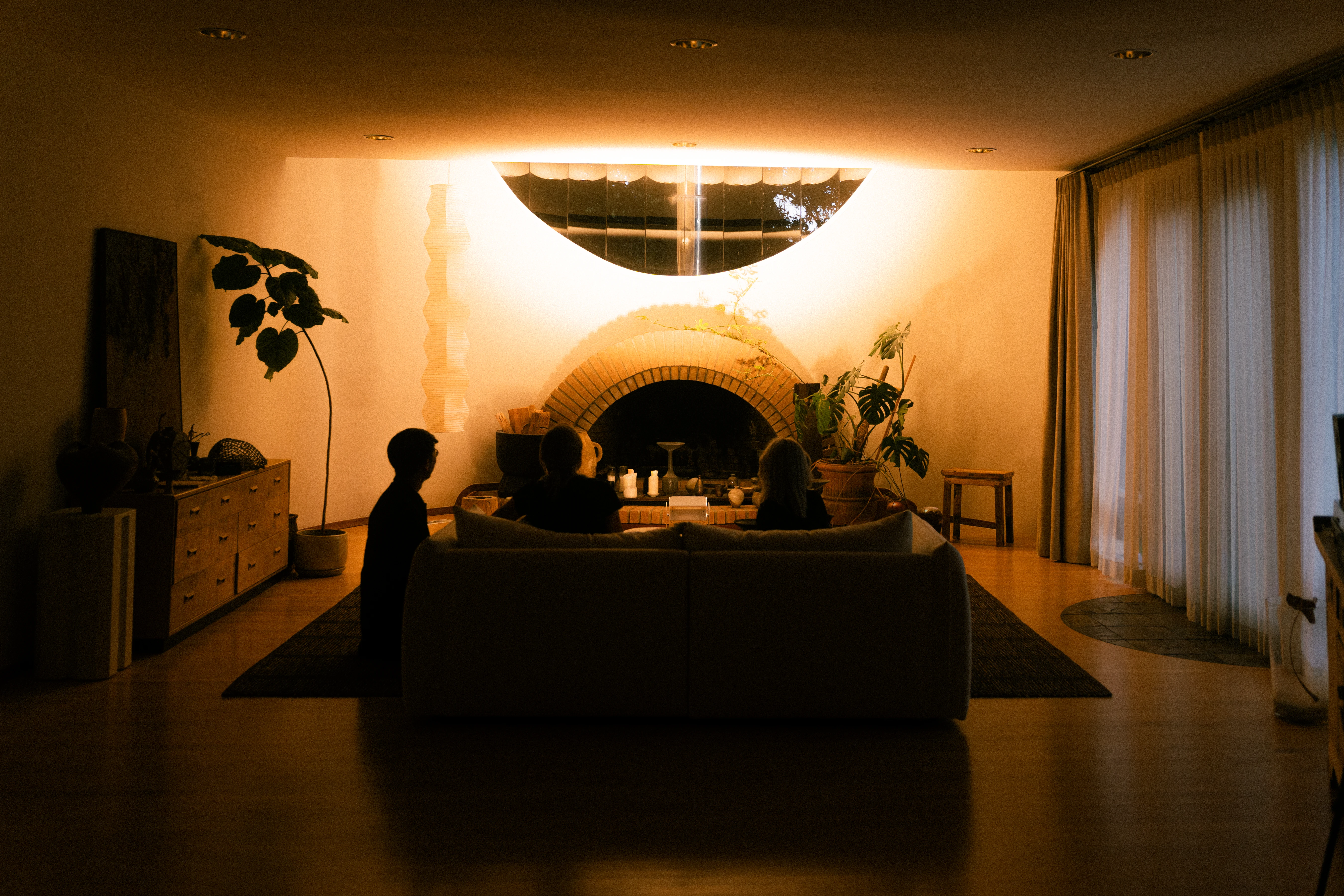 A Rhythm sunlight generator lighting a room — The Moon House