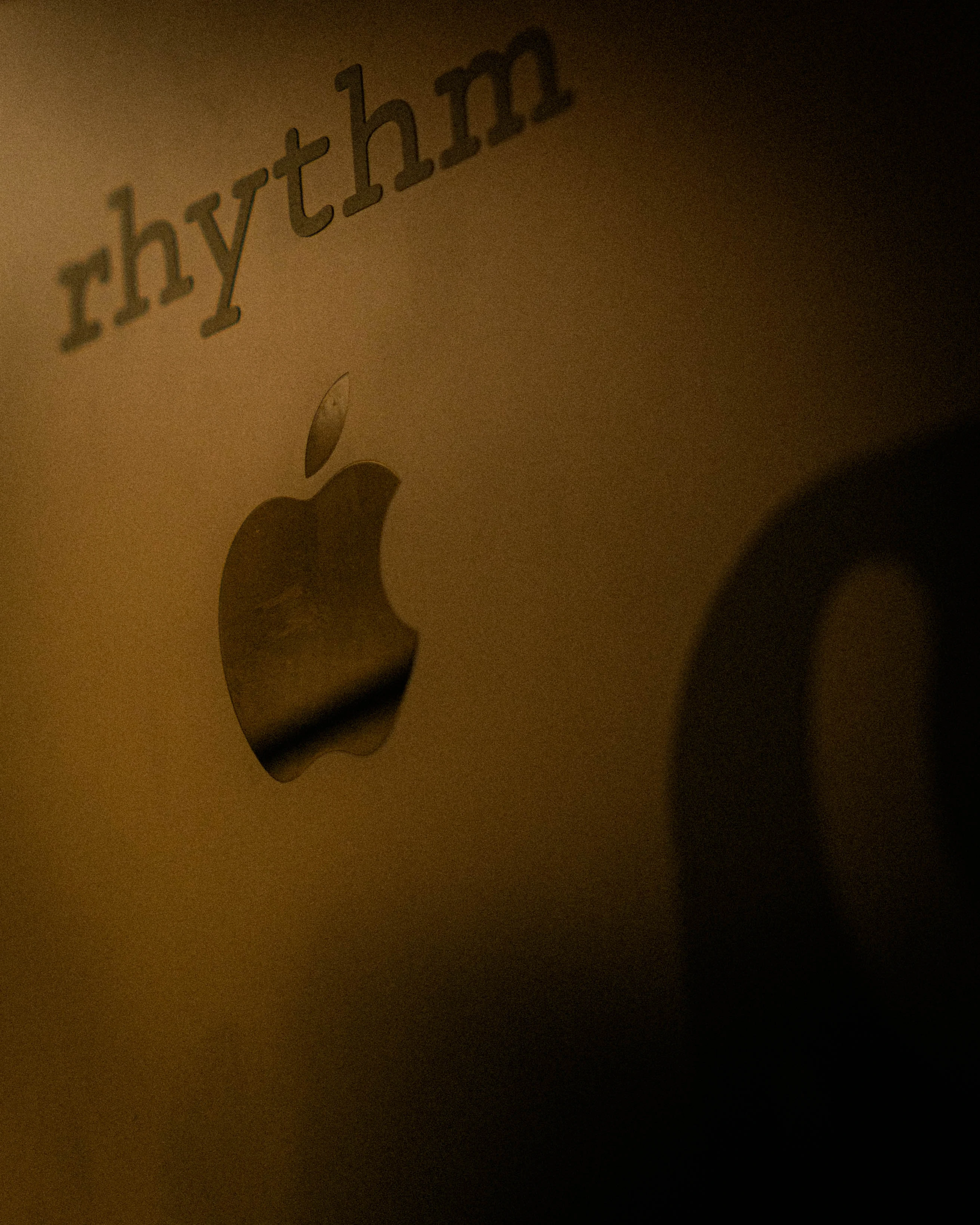 The Rhythm wordmark on the workshop wall