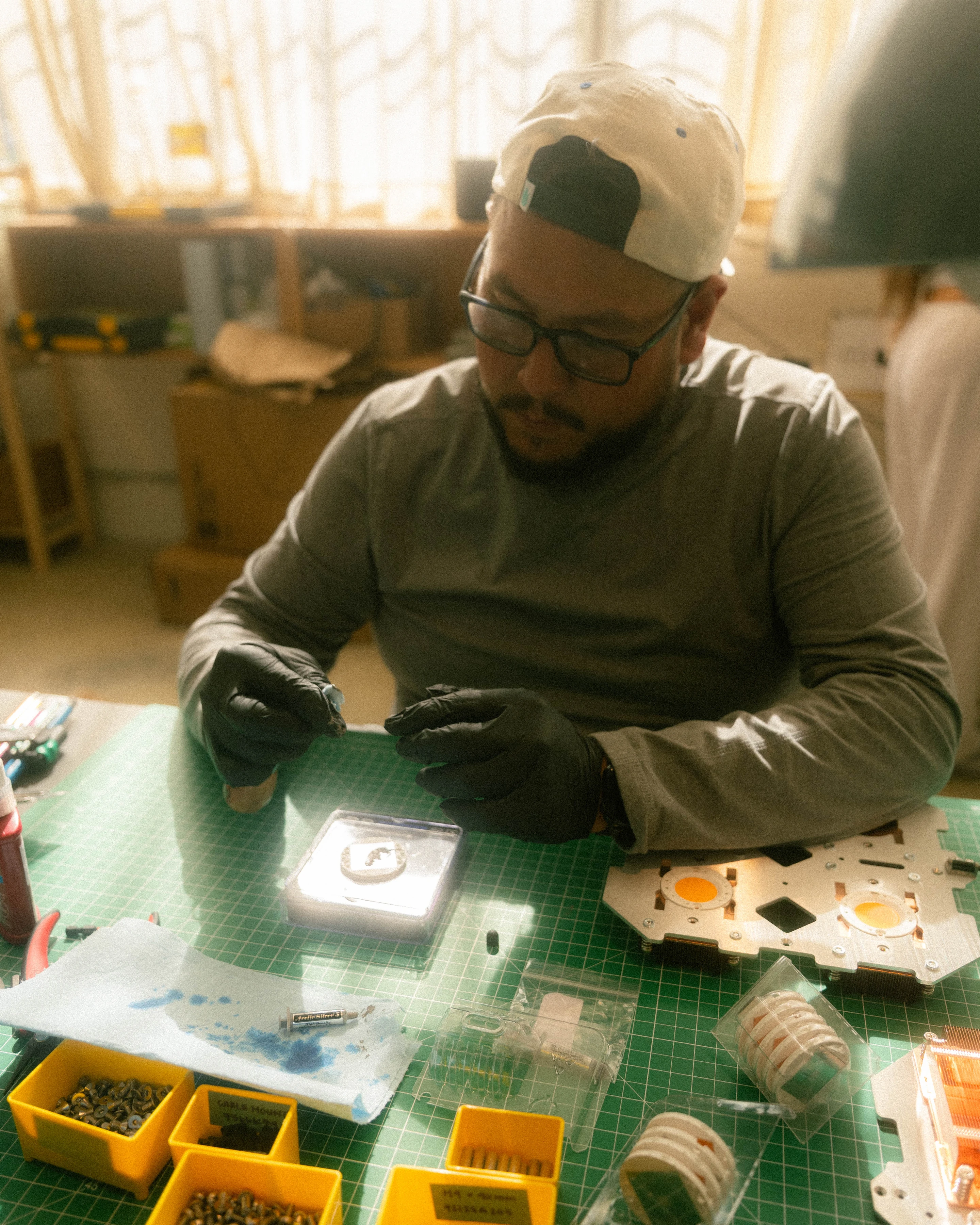 A Rhythm sunlight generator being assembled by hand in the San Francisco workshop