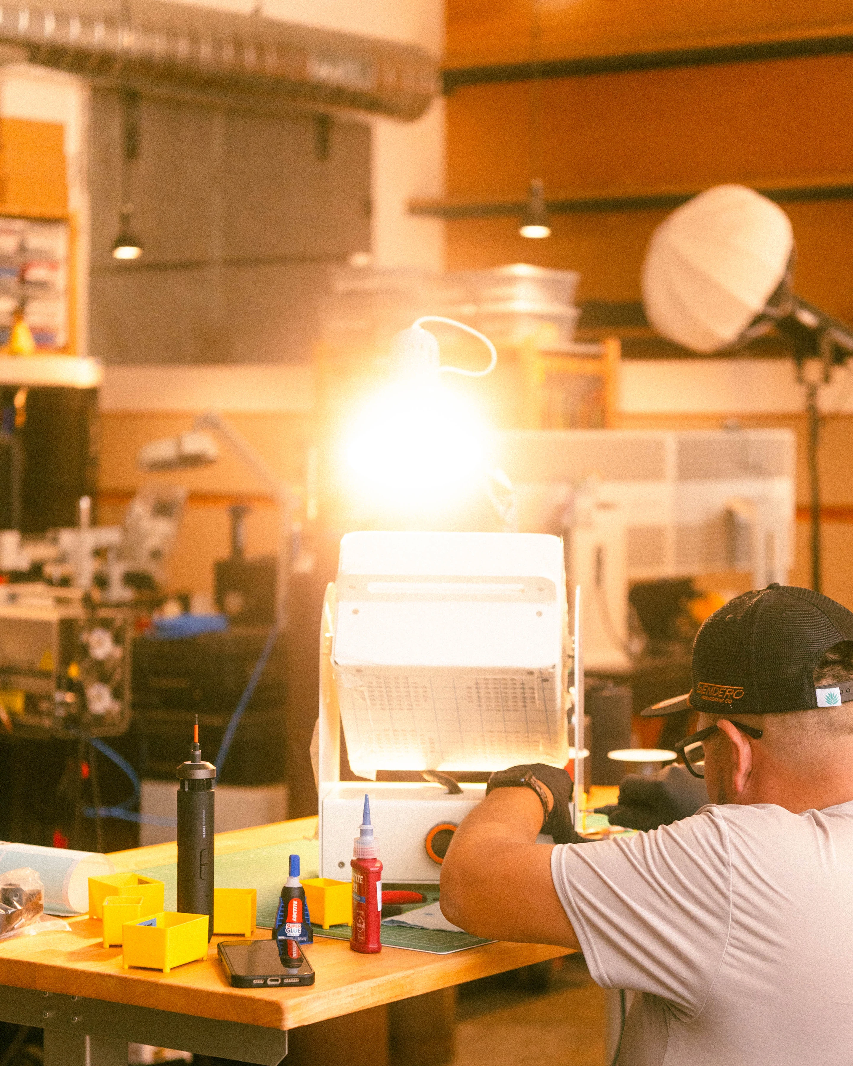 A Rhythm sunlight generator being assembled by hand in the San Francisco workshop
