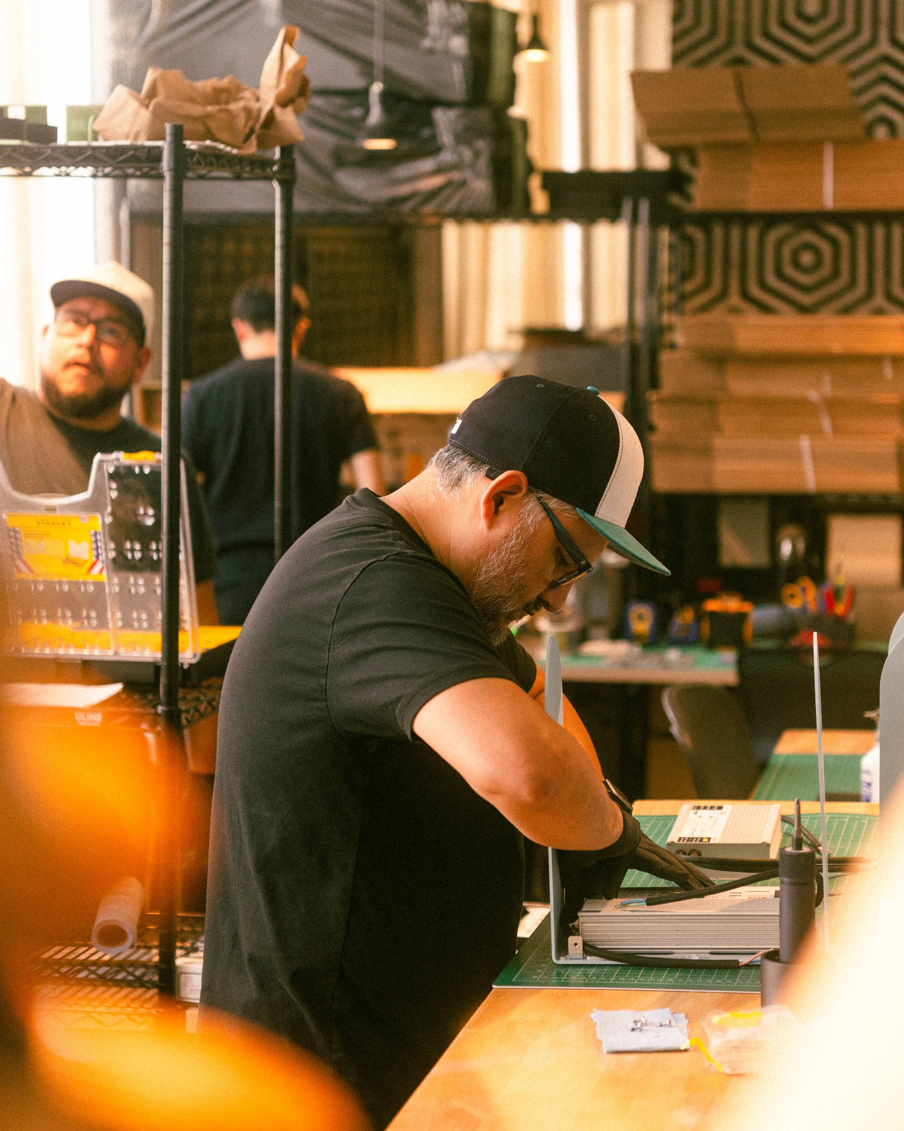 A Rhythm sunlight generator being assembled by hand in the San Francisco workshop