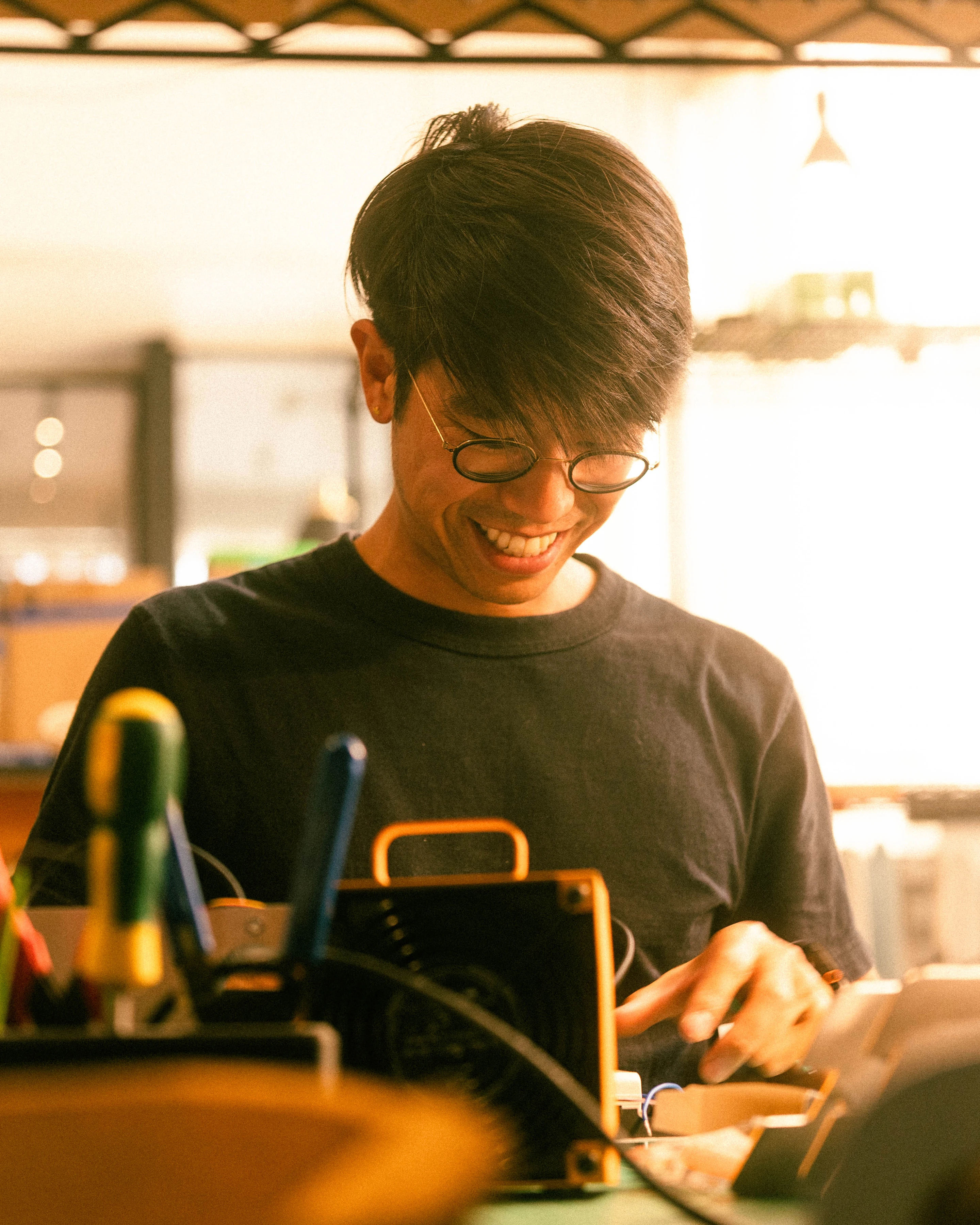 A Rhythm sunlight generator being assembled by hand in the San Francisco workshop